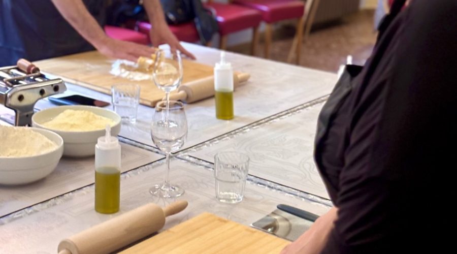 Couple enjoying private Tuscan cooking class in Pisa